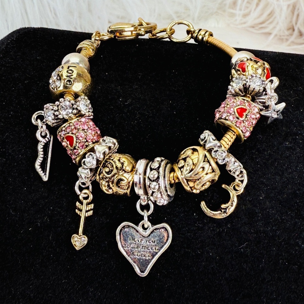 Goldtone love, pink red heart, multi charm bracelet